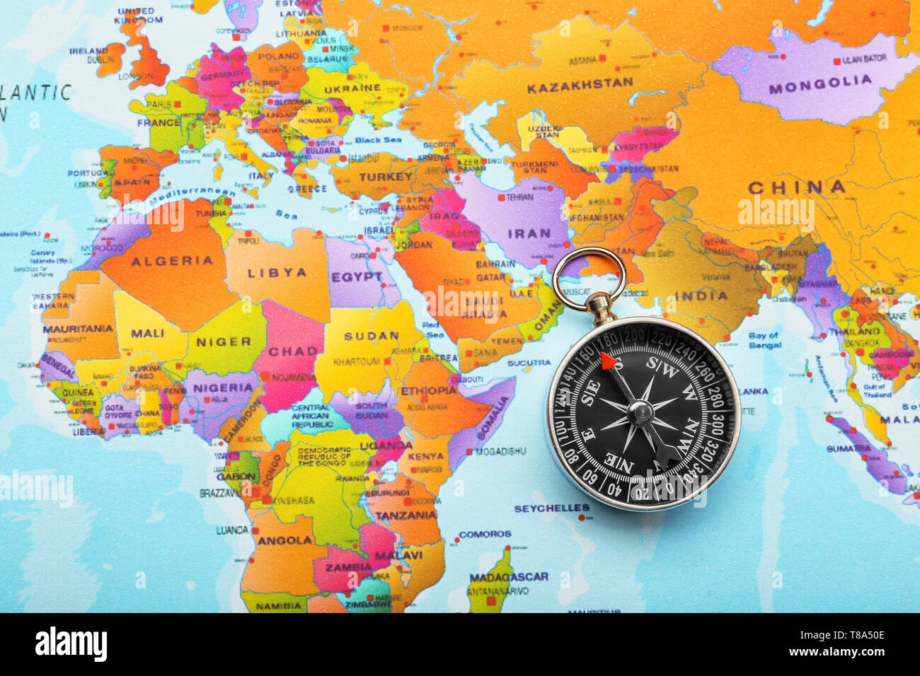 Modern Compass On World Map Travel Planning Concept Stock Photo Alamy